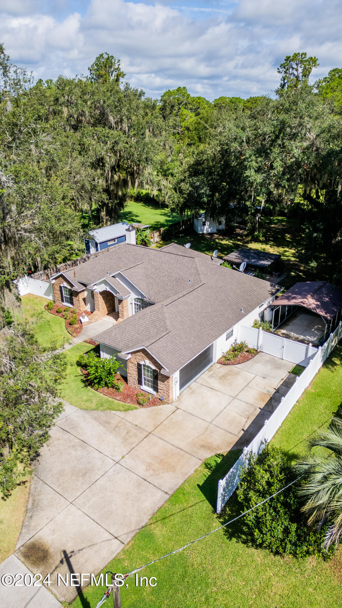 112 Eberhard Avenue Palatka, FL 32177 - Photo 13 of 48 an aerial view of a house with a yard