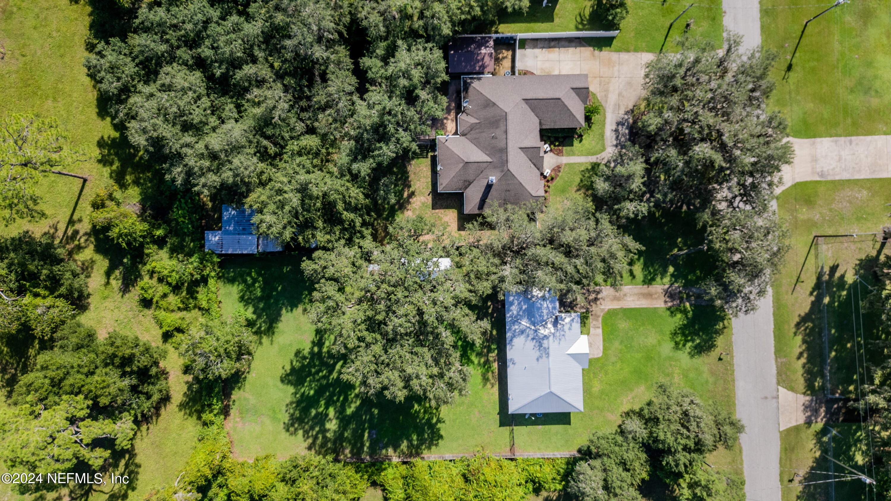 112 Eberhard Avenue Palatka, FL 32177 - Photo 18 of 48 an aerial view of a house with a garden