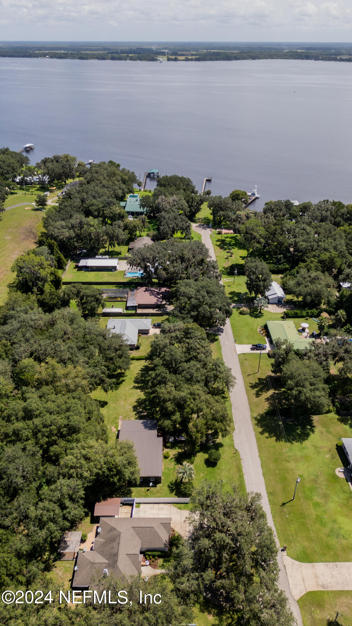 112 Eberhard Avenue Palatka, FL 32177 - Photo 23 of 48 a view of a lake with houses
