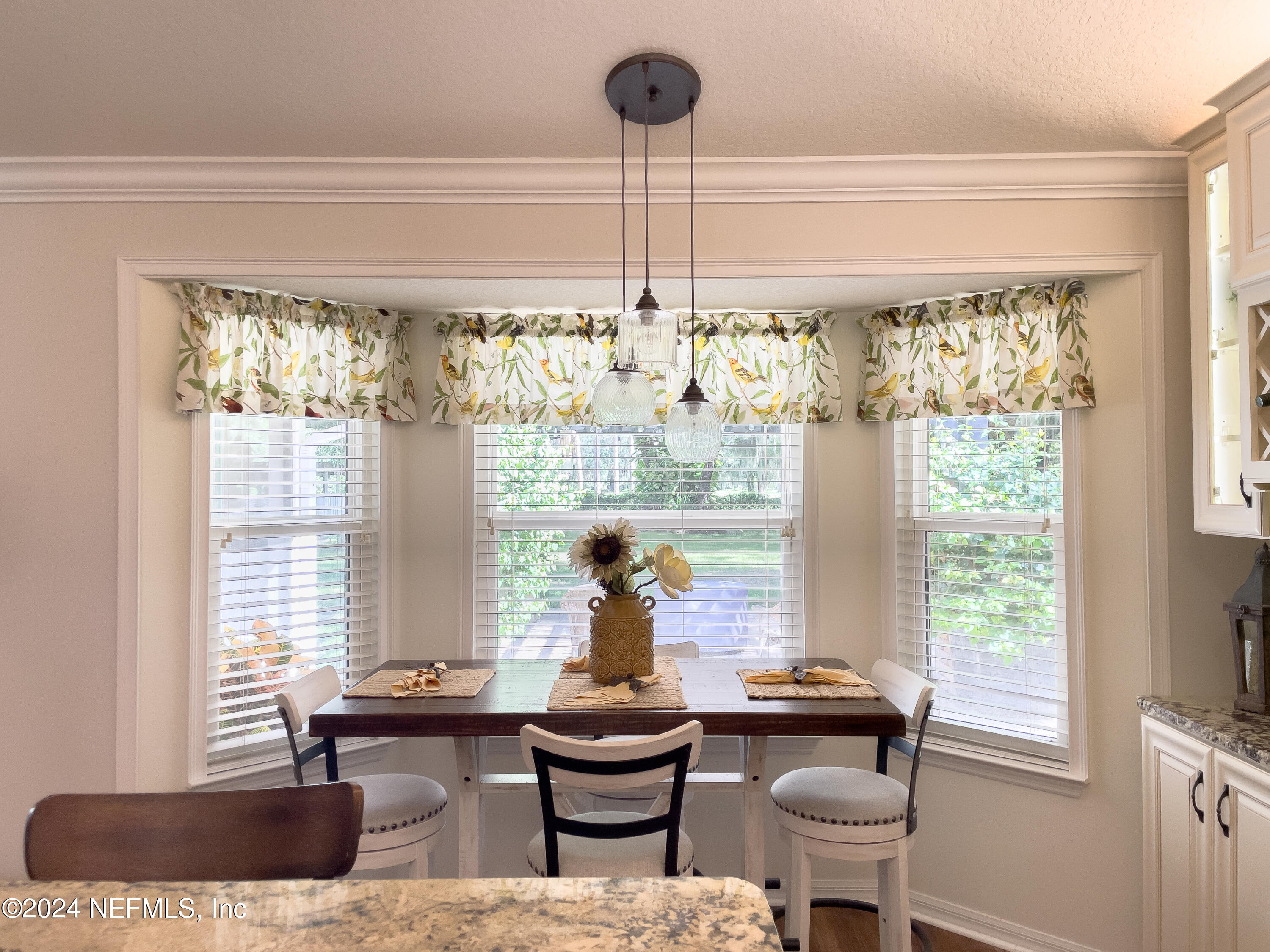 112 Eberhard Avenue Palatka, FL 32177 - Photo 30 of 48 a living room with furniture and a large window