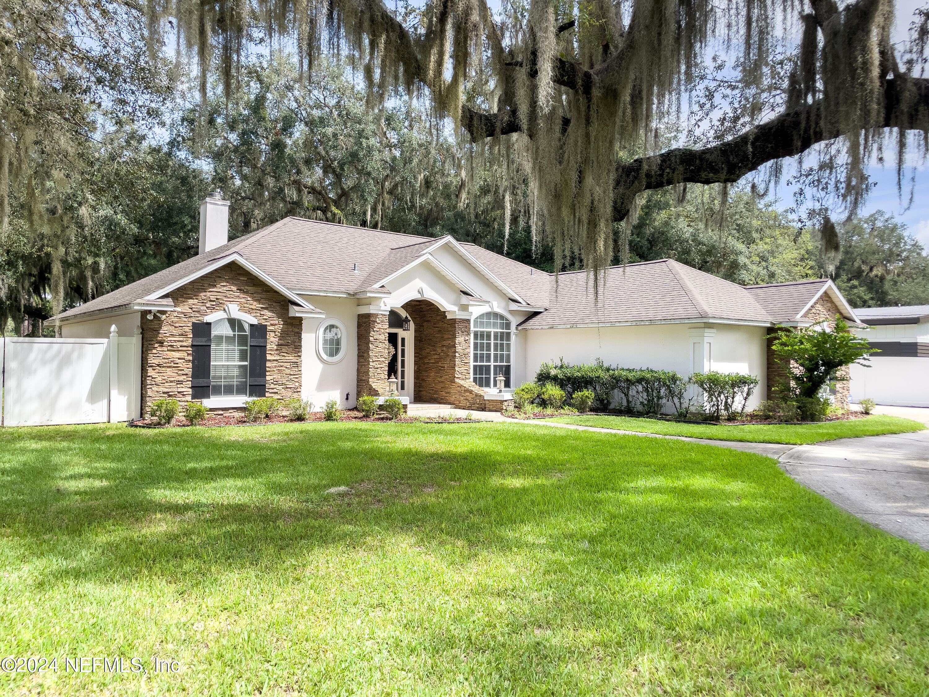 112 Eberhard Avenue Palatka, FL 32177 - Photo 4 of 48 a view of a house with a yard and sitting area