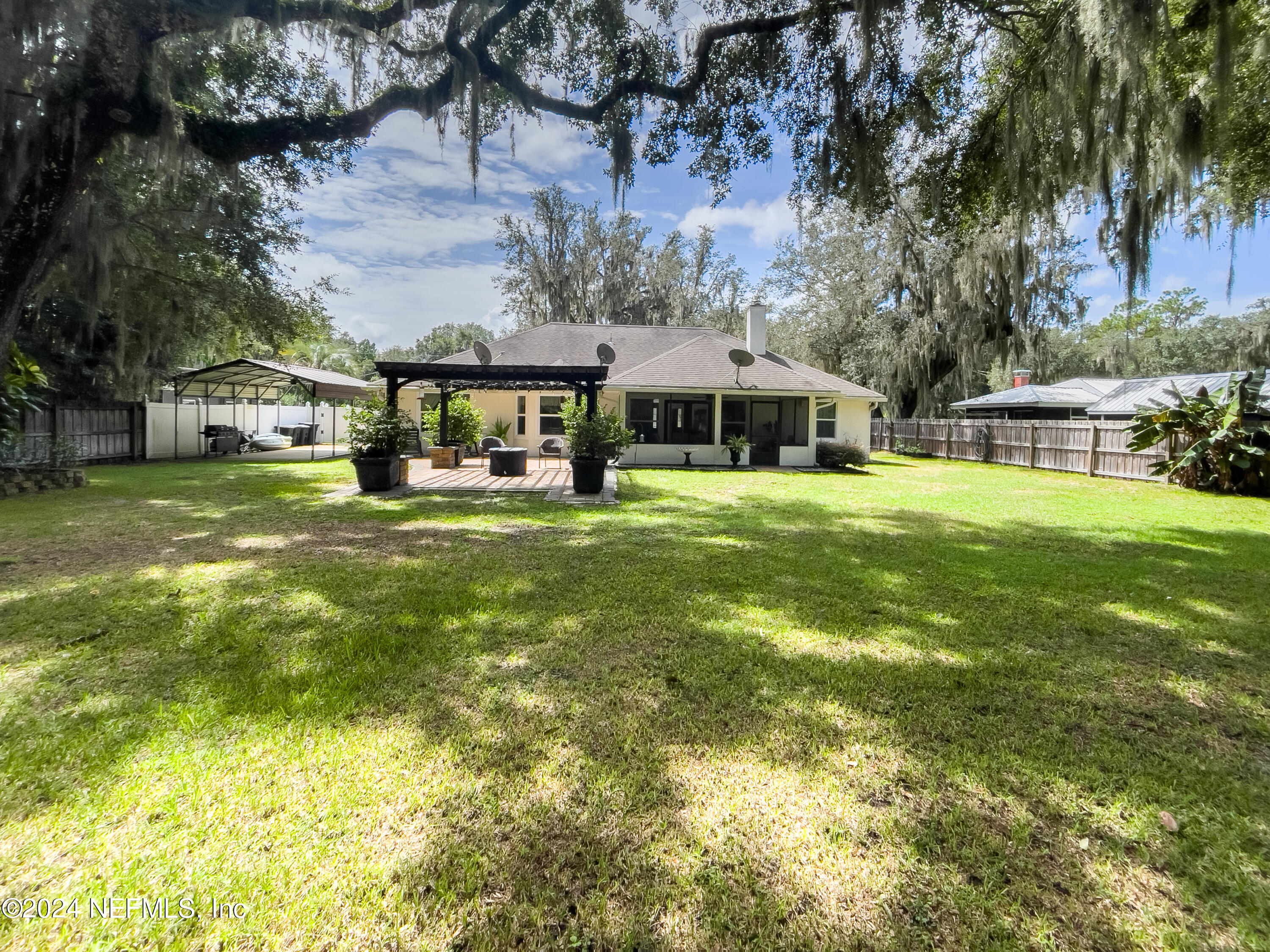 112 Eberhard Avenue Palatka, FL 32177 - Photo 6 of 48 a front view of house with yard and green space