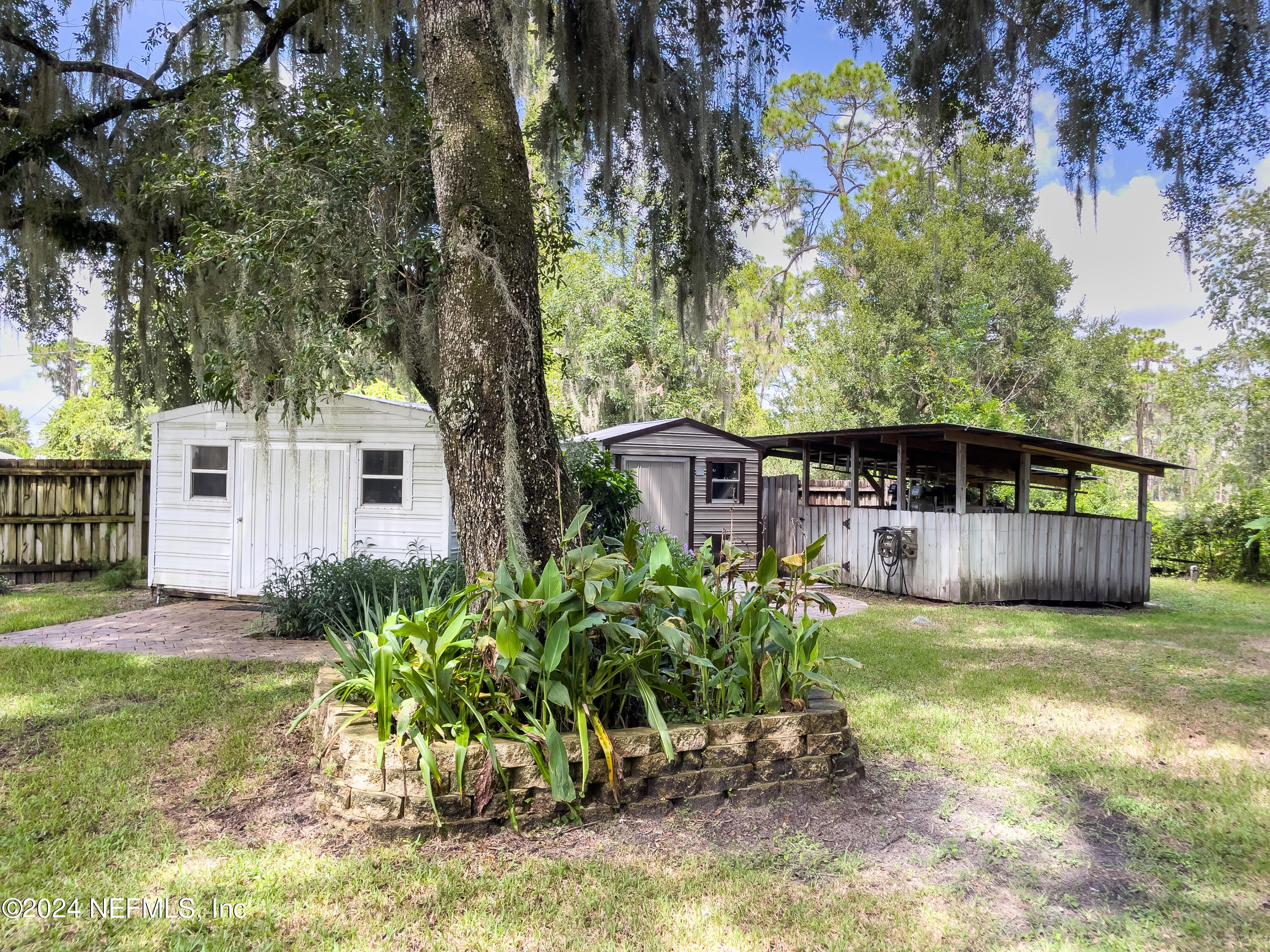 112 Eberhard Avenue Palatka, FL 32177 - Photo 9 of 48 a view of a house with a yard