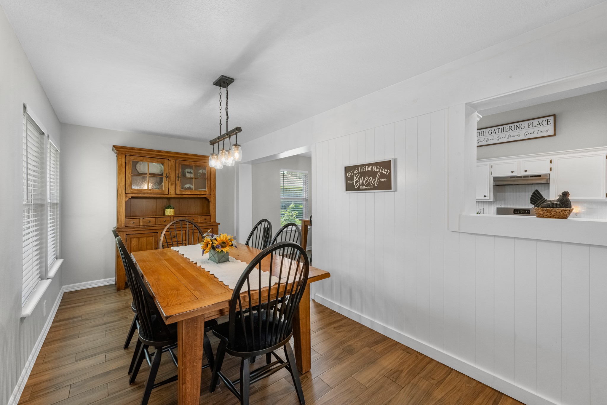 606 Walnut Street Sweeny, TX 77480 - Photo 16 of 28 a view of a dining room with furniture window and wooden floor