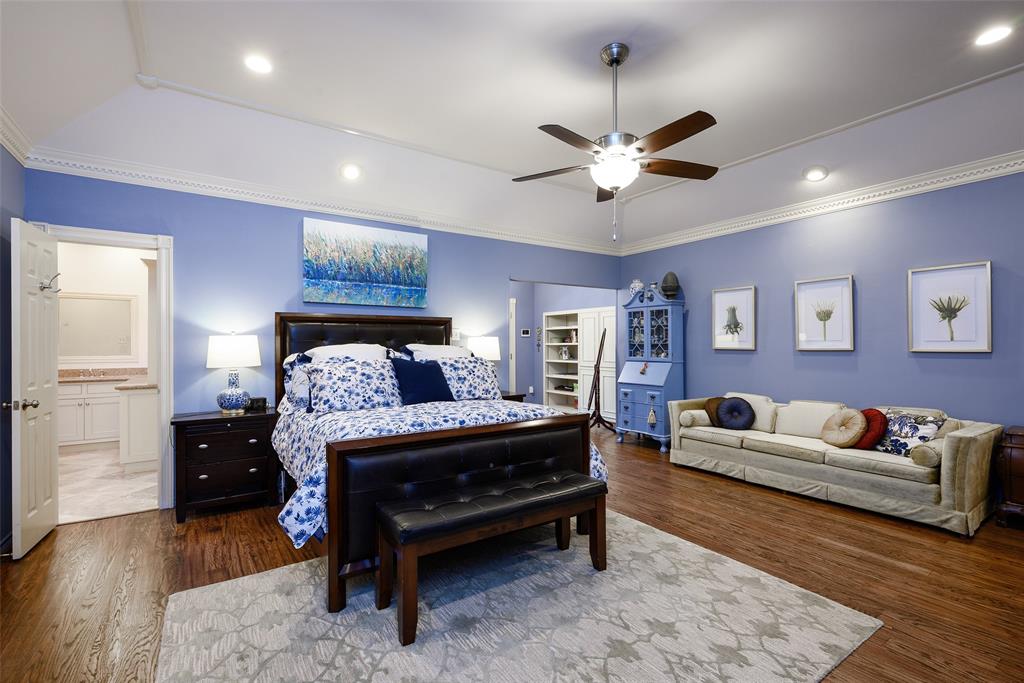 6822 Meadow Road Dallas, TX 75230 - Photo 11 of 35 Very large Primary Bedroom with separate sitting room. Hand scraped wood floors 2022.