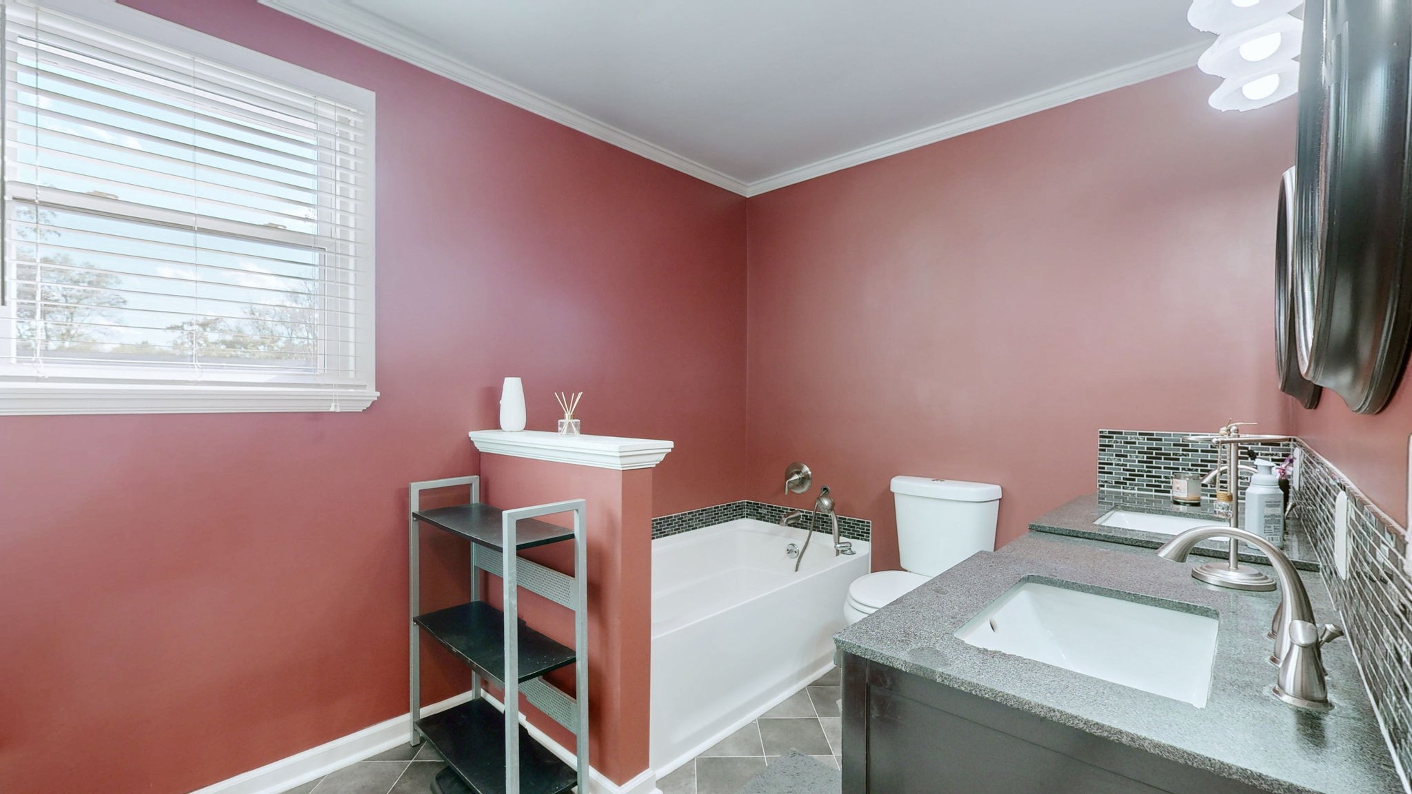 2245 North Ranch Road Murfreesboro, TN 37129 - Photo 14 of 29 a bathroom with a sink a toilet and a mirror