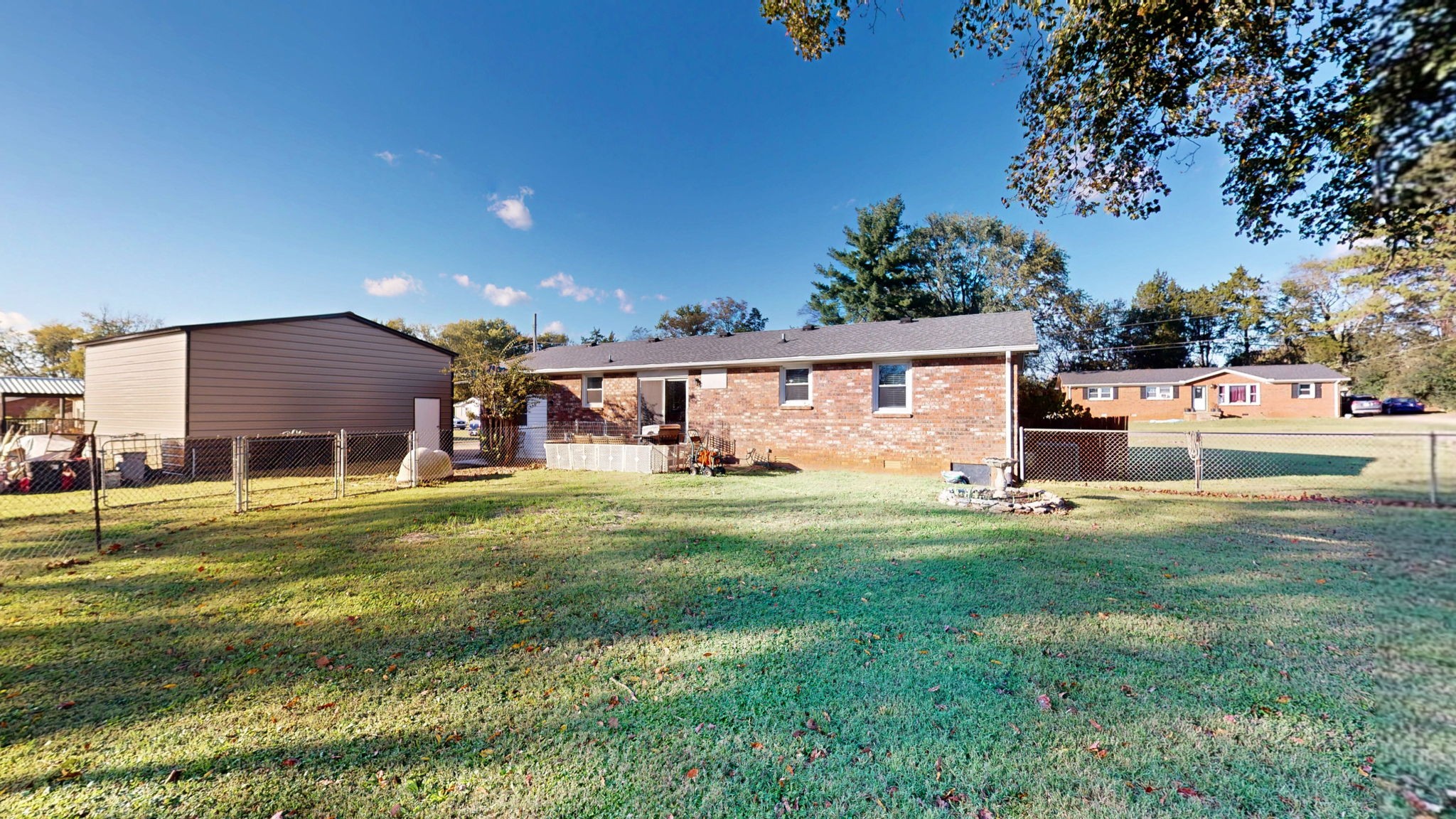 2245 North Ranch Road Murfreesboro, TN 37129 - Photo 25 of 29 a front view of a house with a garden