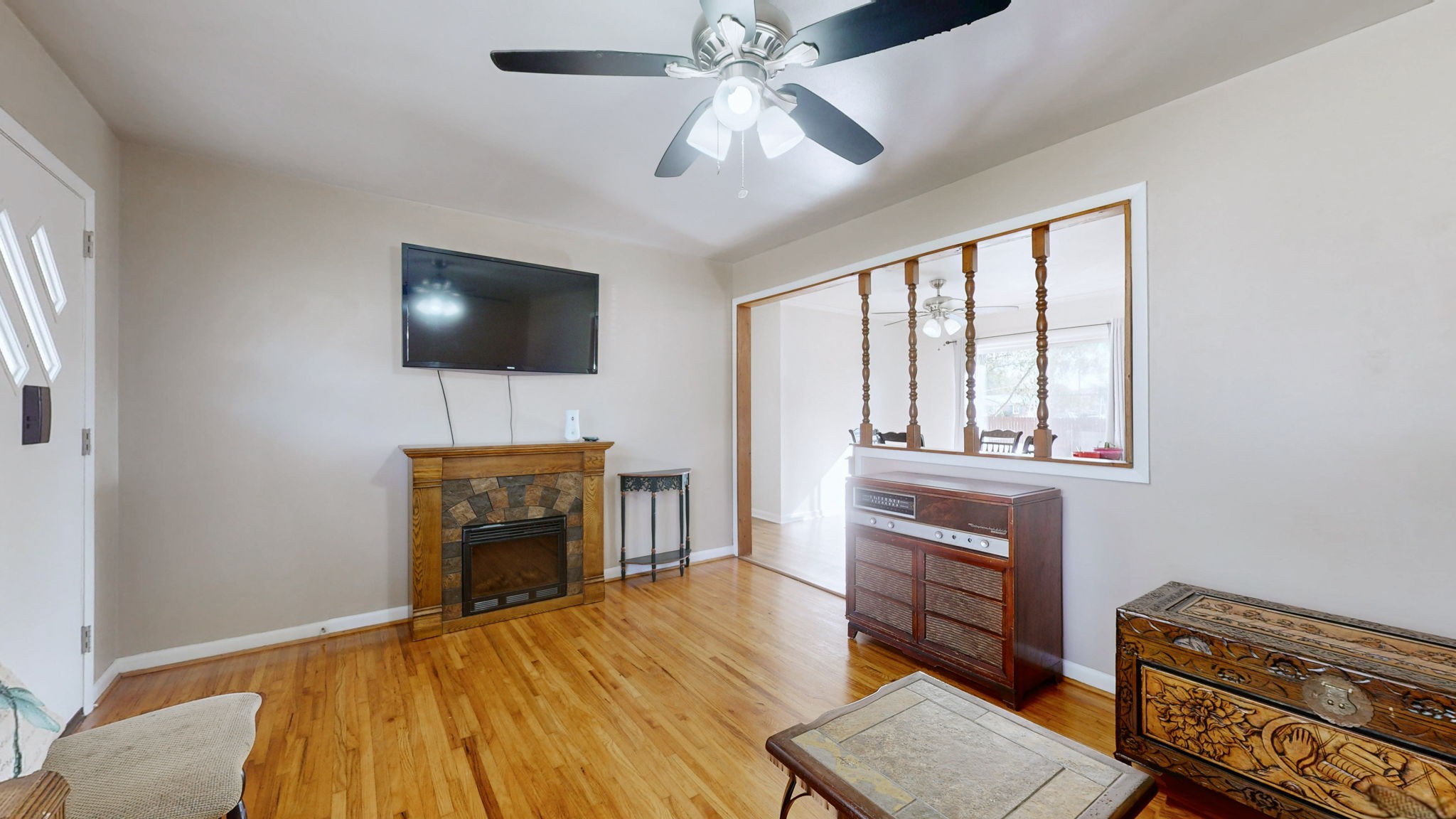 2245 North Ranch Road Murfreesboro, TN 37129 - Photo 4 of 29 a living room with furniture a fireplace and a flat screen tv