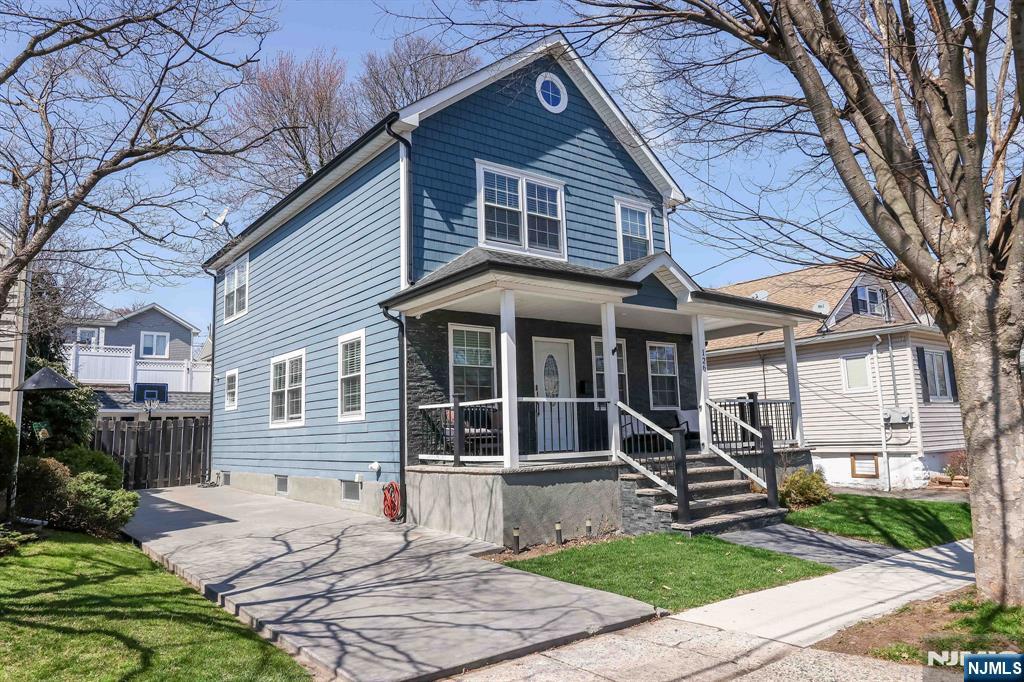 126 Ridge Avenue Bloomfield, NJ 07003 - Photo 2 of 45 a view of house with a yard