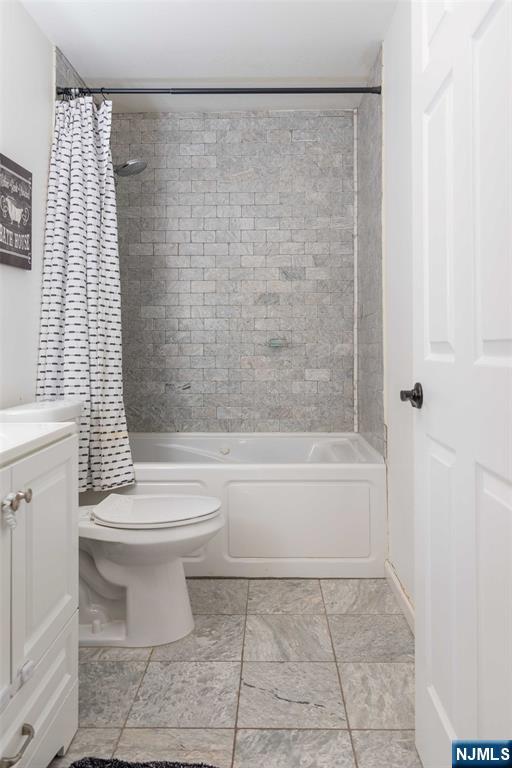 126 Ridge Avenue Bloomfield, NJ 07003 - Photo 25 of 45 a bathroom with a toilet and a shower