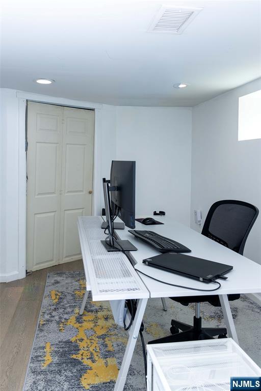 126 Ridge Avenue Bloomfield, NJ 07003 - Photo 37 of 45 a table and chairs in a room