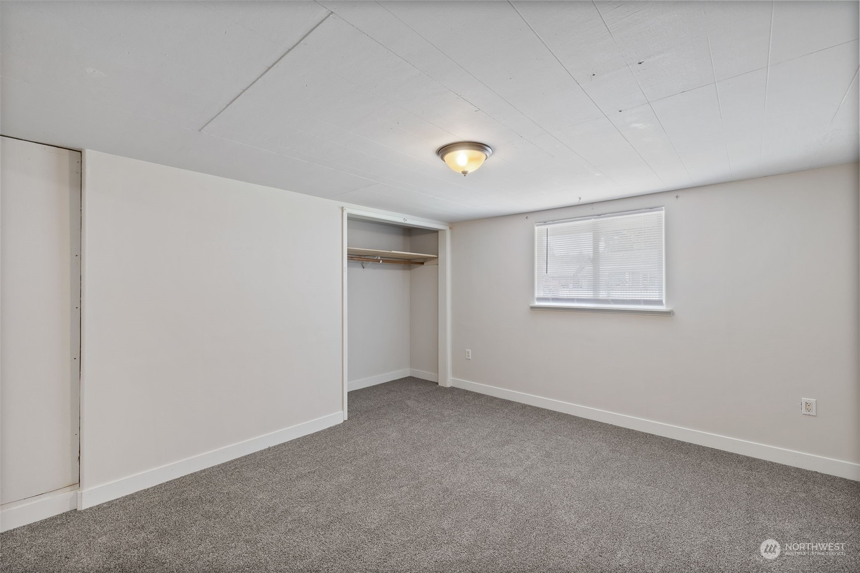 17 Fern Road Everett, WA 98203 - Photo 14 of 24 a view of an empty room with a window