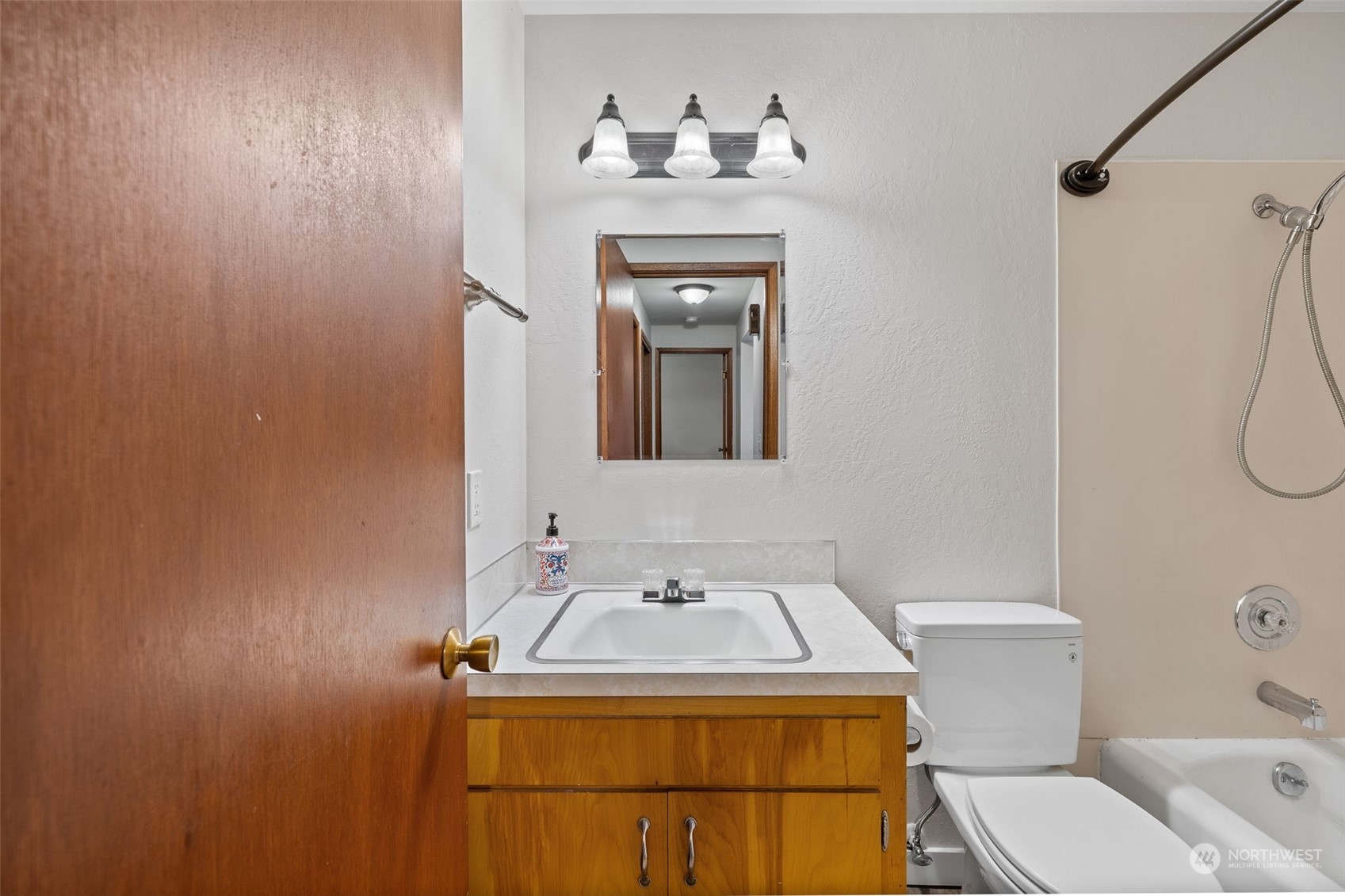 17 Fern Road Everett, WA 98203 - Photo 18 of 24 a bathroom with a sink a toilet and mirror