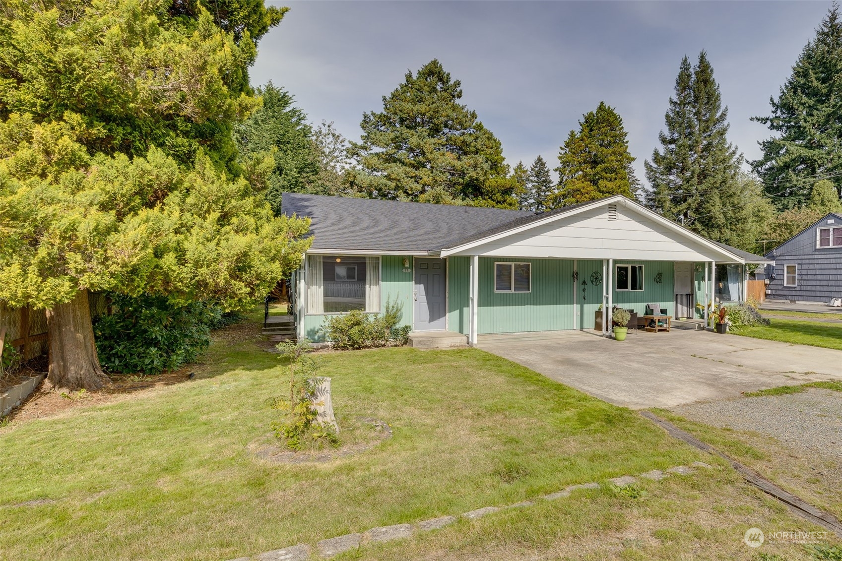 17 Fern Road Everett, WA 98203 - Photo 3 of 24 a front view of a house with yard patio and green space