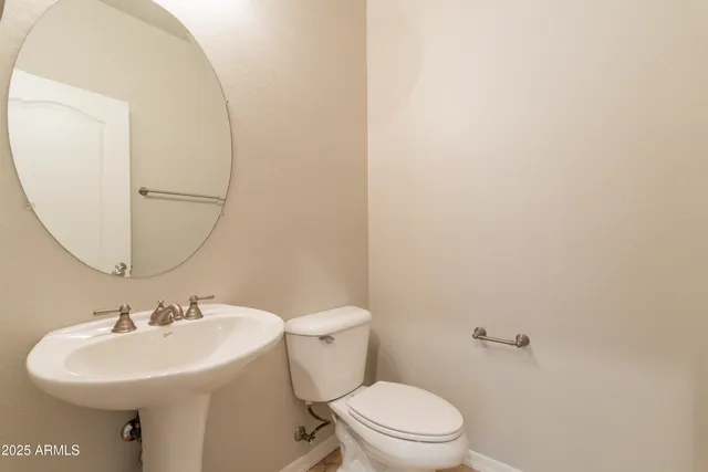 a large bathroom with a large tub and sink