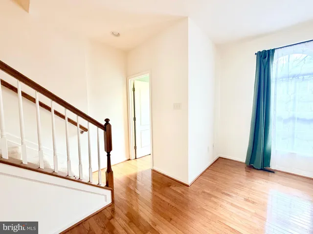 a view of entryway with wooden floor