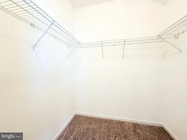 a view of small space with racks on the wall