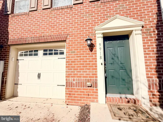 a view of a wooden door of the house