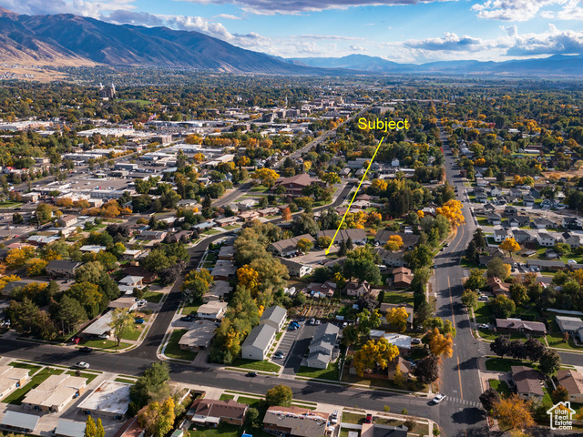 190 West 700 North Logan, UT 84321 - Photo 35 of 51 Aerial overview of property's location featuring a mountainous background and nearby suburban area