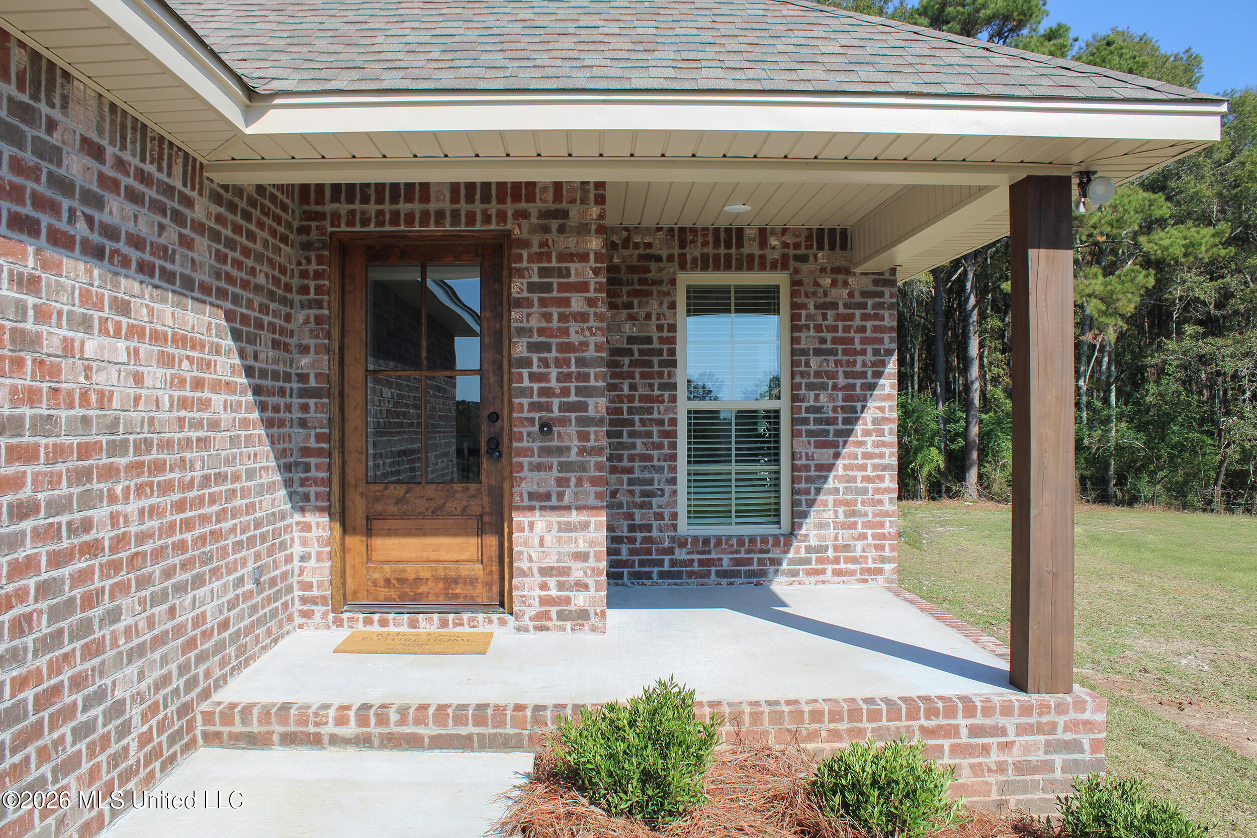 80 Meadow Breeze Road Sumrall, MS 39482 - Photo 2 of 30 02 Covered Front Porch