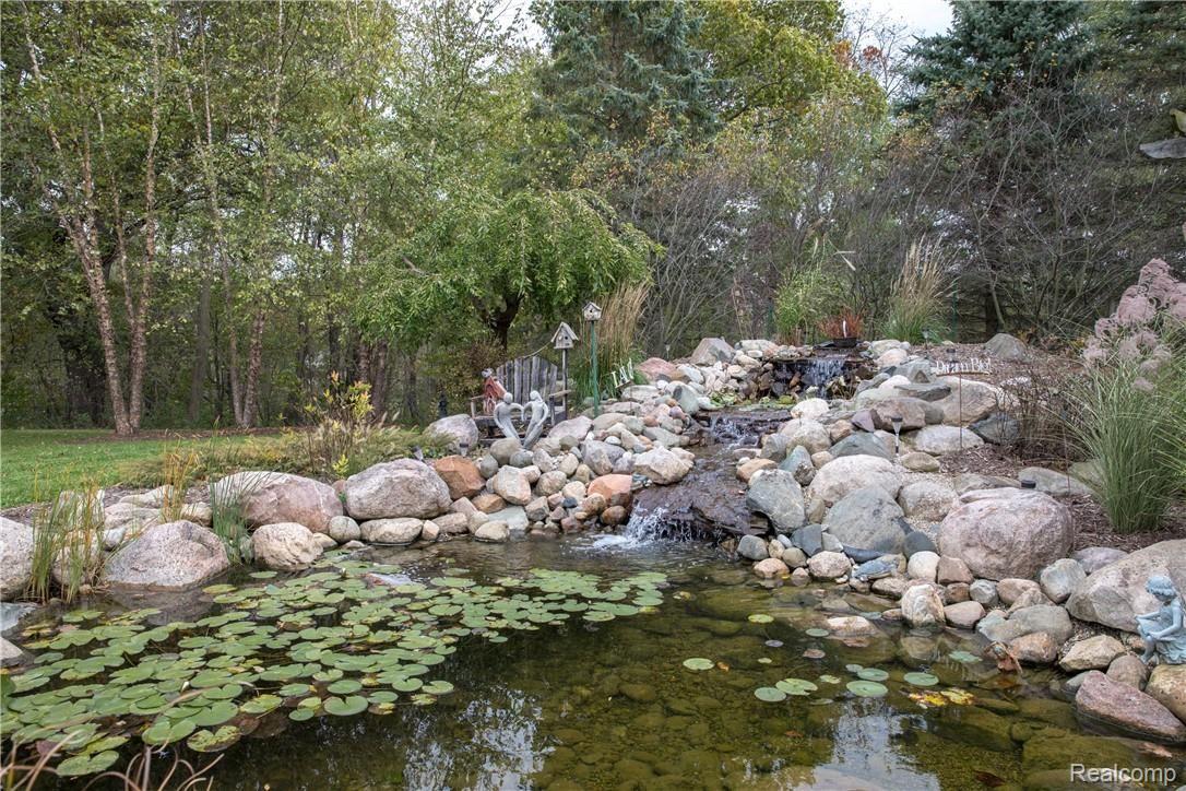 7432 Dutch Road Goodrich, MI 48438 - Photo 6 of 35 or Relax listening to the sounds of your Custom Waterfall and Pond