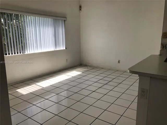 a view of a room & window