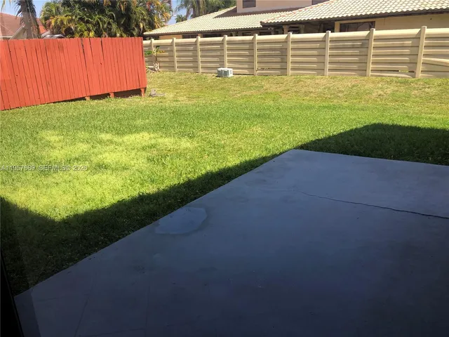 a view of outdoor space and yard