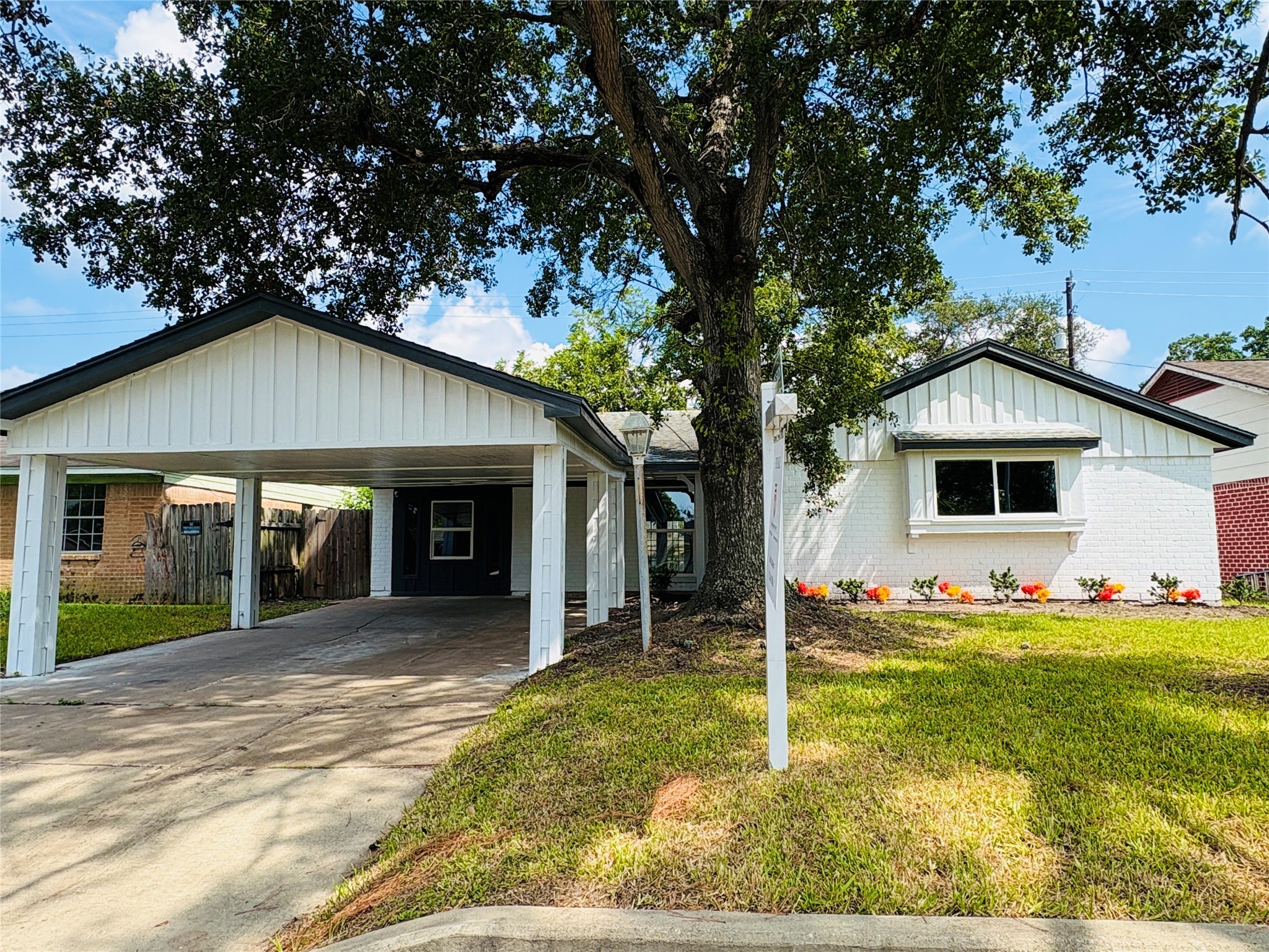 3726 Heatherbrook Drive Houston, TX 77045 - Photo 1 of 17 a house with trees in the background