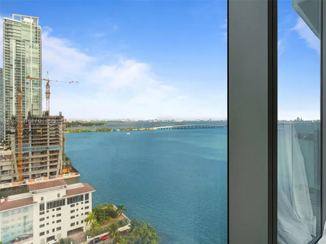a view of a balcony with lake view