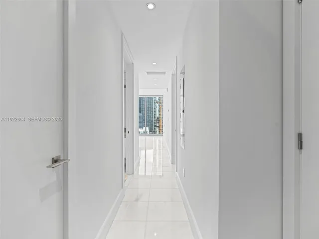 a view of a bathroom from the hallway