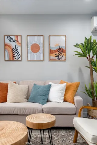 a living room with furniture and a couch