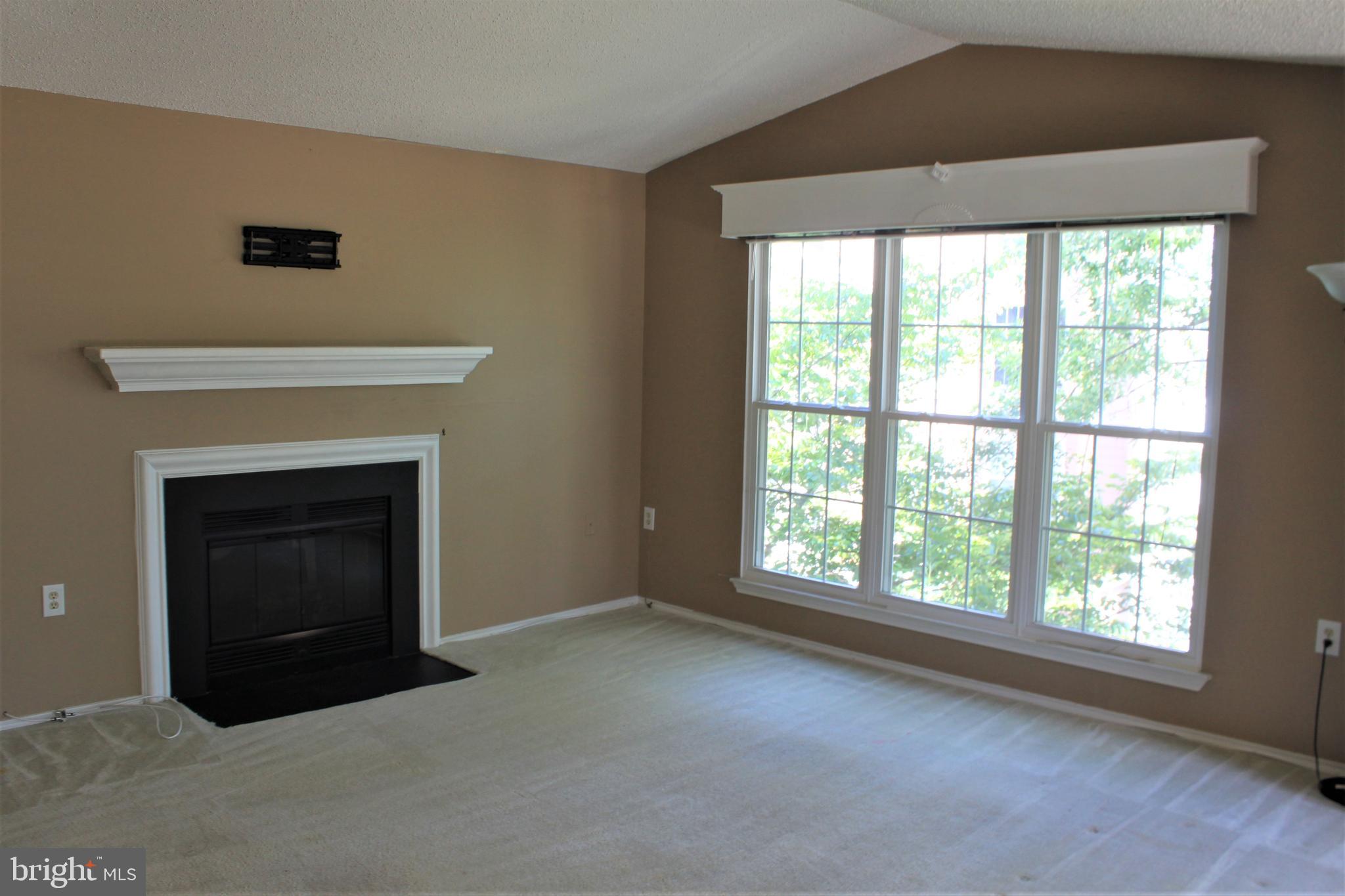 20952 Timber Ridge Terrace, Unit 302 Ashburn, VA 20147 - Photo 6 of 13 Family room