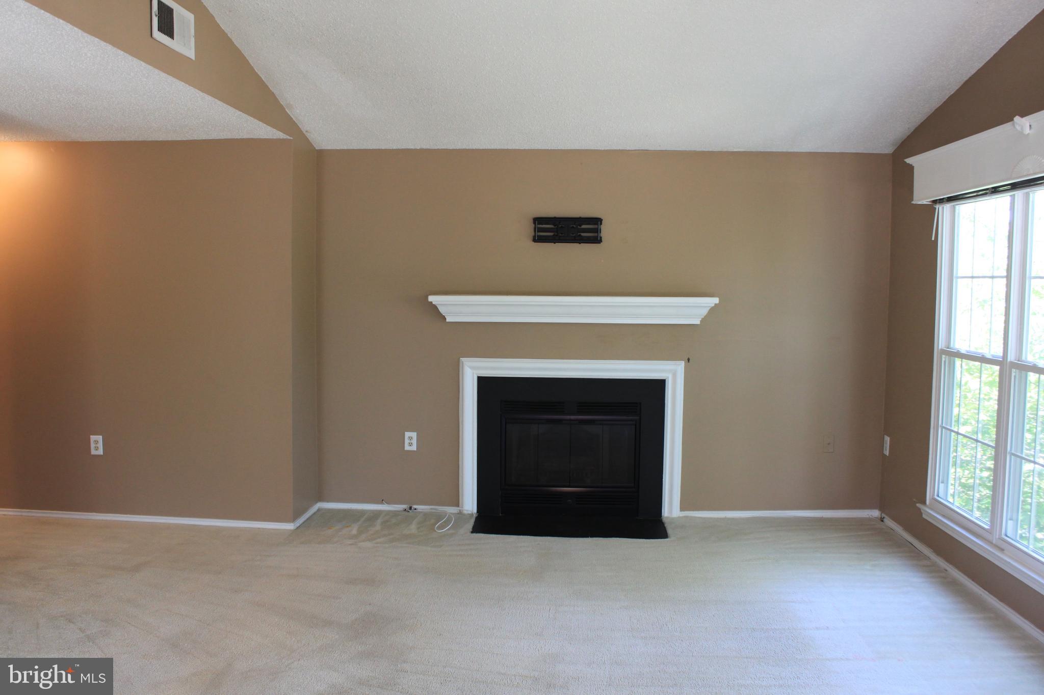 20952 Timber Ridge Terrace, Unit 302 Ashburn, VA 20147 - Photo 7 of 13 Family room