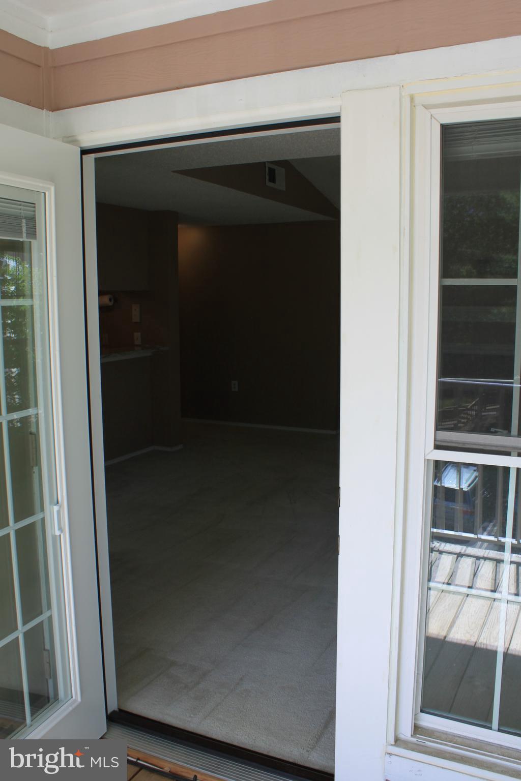 20952 Timber Ridge Terrace, Unit 302 Ashburn, VA 20147 - Photo 10 of 13 Deck to inside