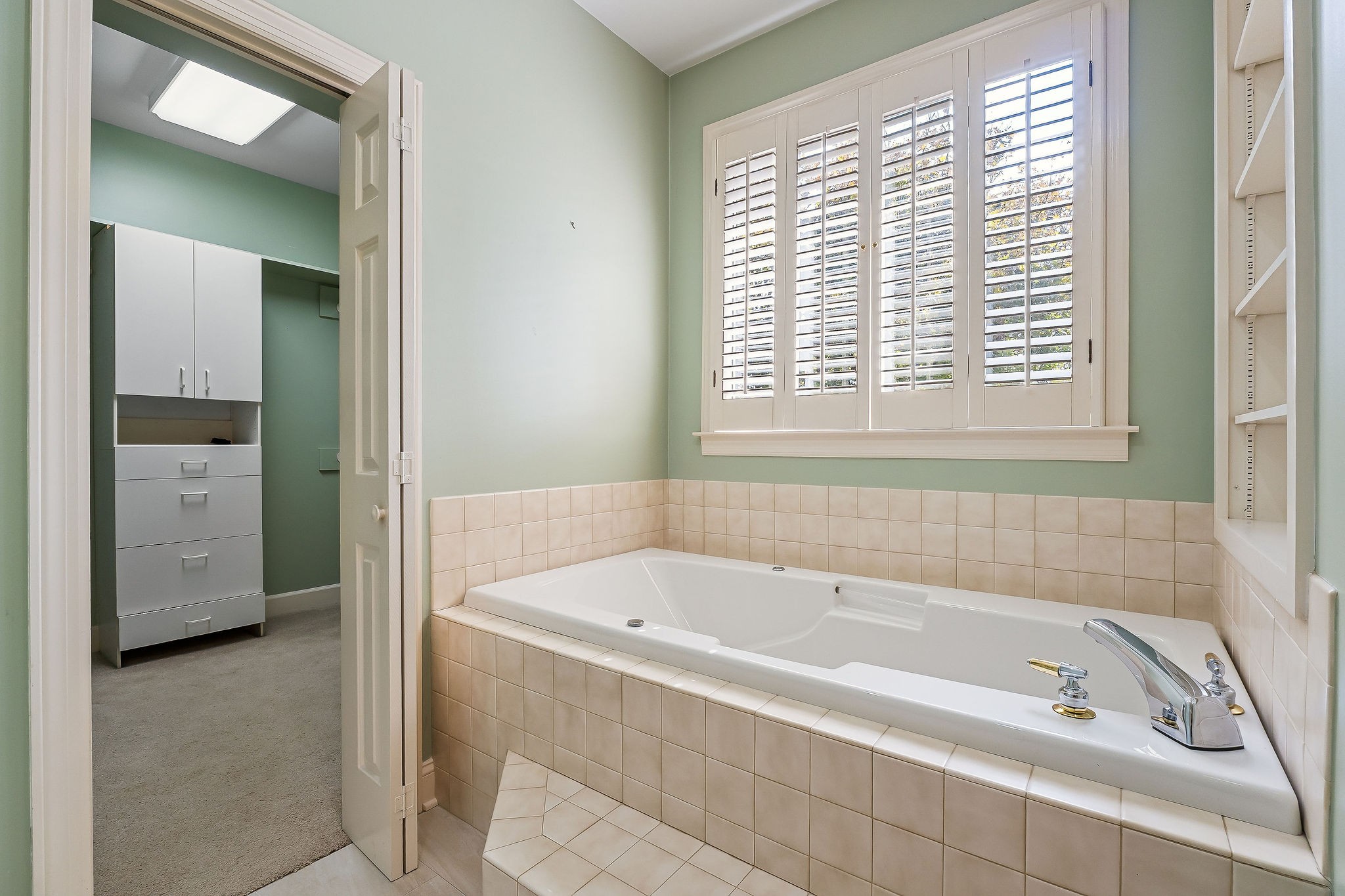 328 Riley Avenue Smithville, TN 37166 - Photo 18 of 40 a white bath tub sitting next to a window