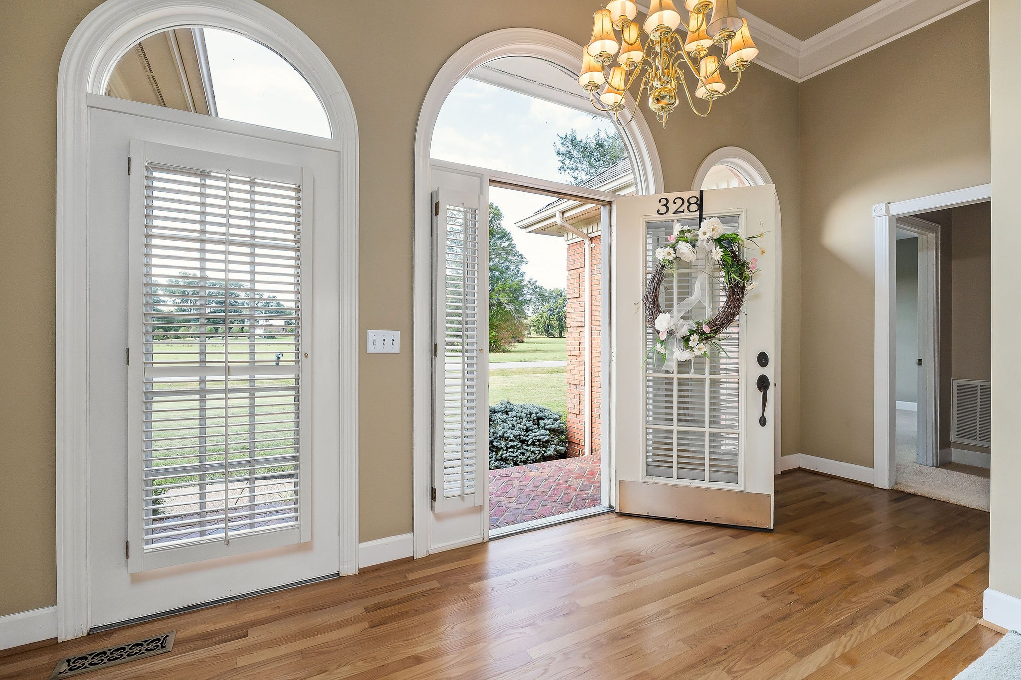 328 Riley Avenue Smithville, TN 37166 - Photo 2 of 40 wooden floor in an empty room with a window
