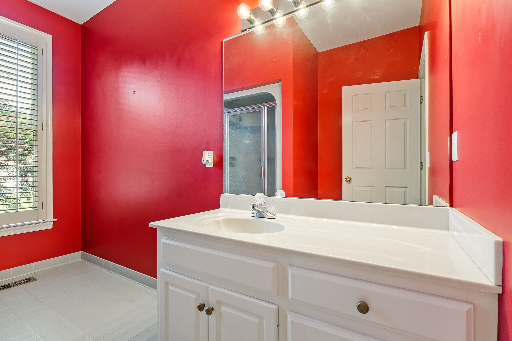 328 Riley Avenue Smithville, TN 37166 - Photo 24 of 40 a bathroom with a sink vanity and a mirror
