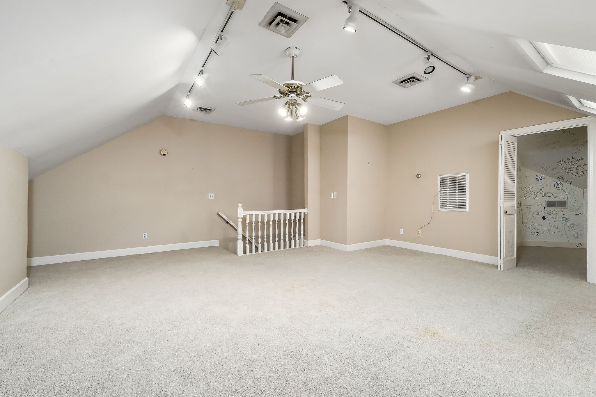 328 Riley Avenue Smithville, TN 37166 - Photo 29 of 40 an empty room with chandelier fan and windows