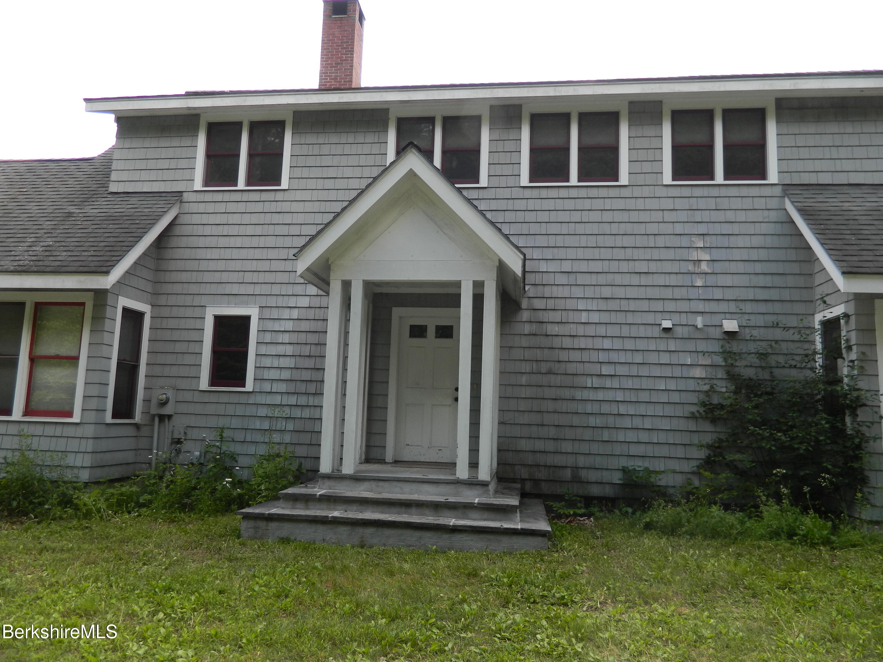 325 Cross Place Road Washington, MA 01223 - Photo 8 of 61 a front view of a house with a yard