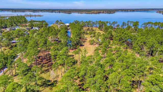 a view of swimming pool with a patio