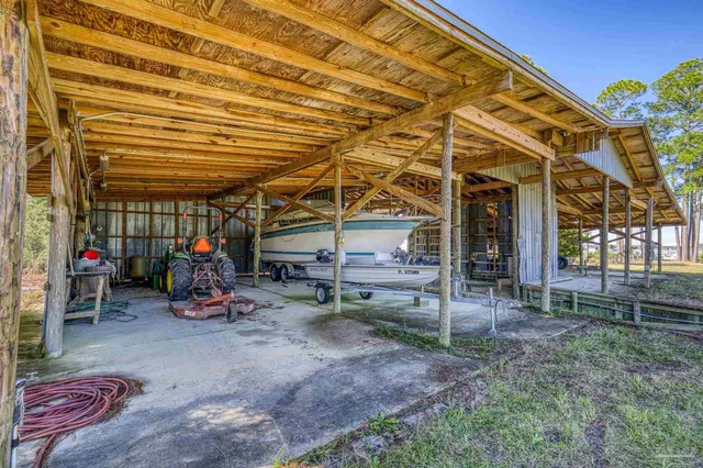 a view of a backyard of the house