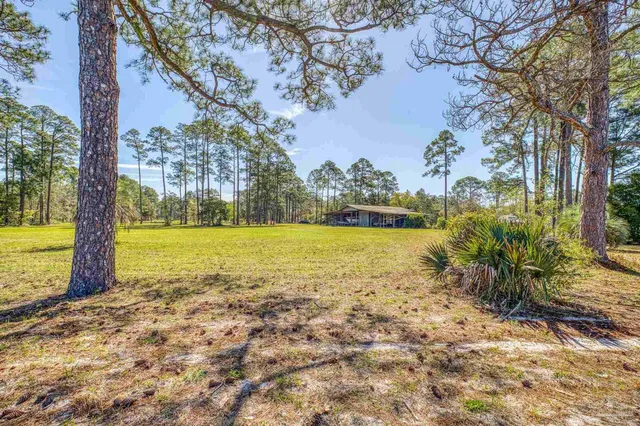 a view of swimming pool with an outdoor space and seating area