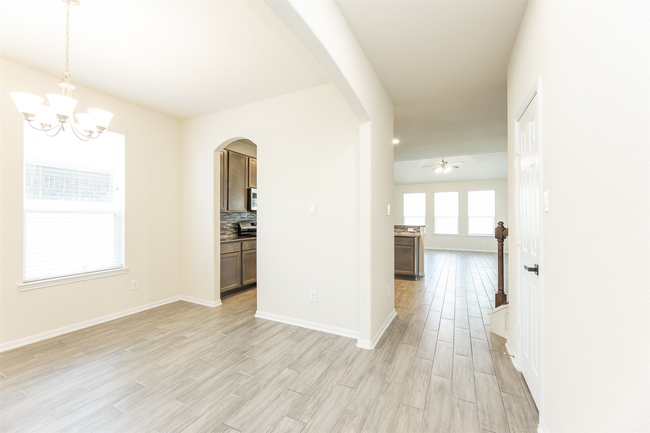 2293 Garden Square Path Spring, TX 77386 - Photo 10 of 32 a view of a room with wooden floor and a window