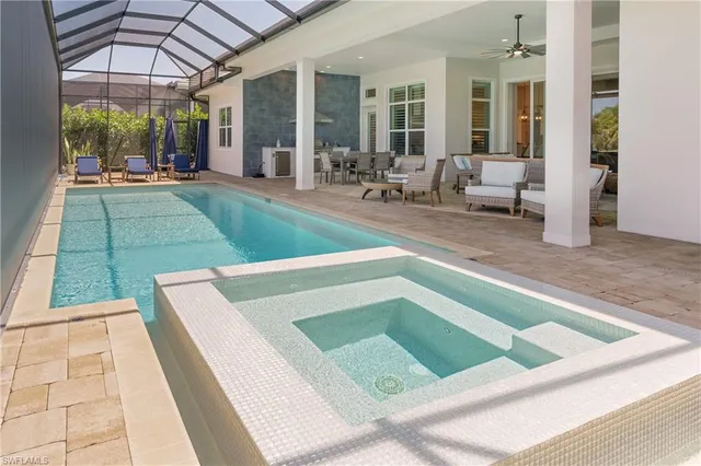 a view of swimming pool with patio