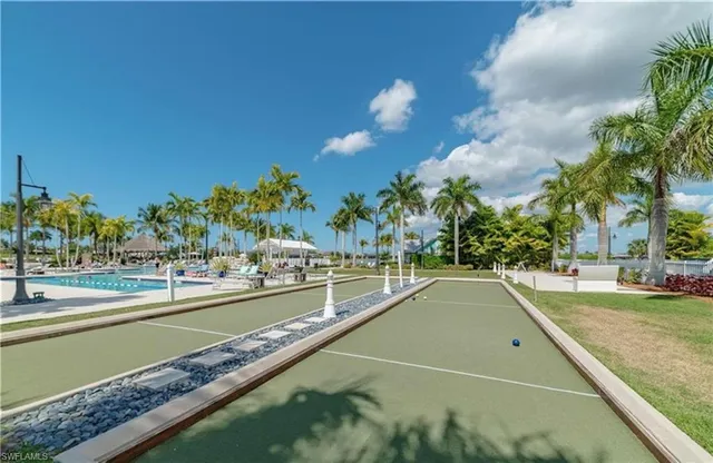 a view of a swimming pool and an outdoor space