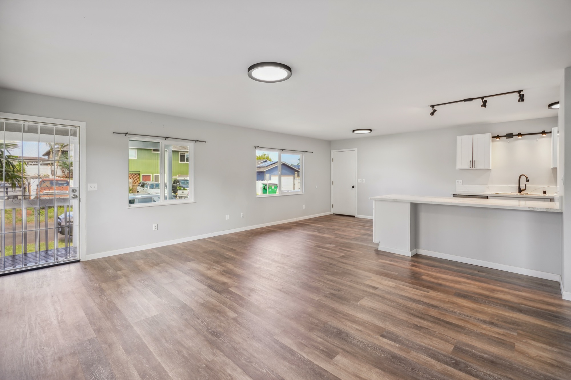 1974 Nana Pali Road Lihue, HI 96766 - Photo 16 of 28 a view of an empty room with wooden floor and a window