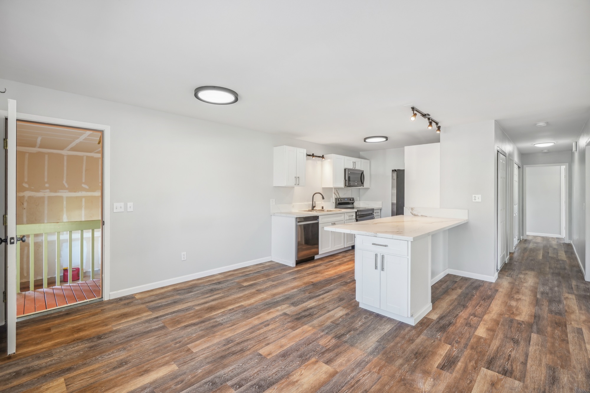 1974 Nana Pali Road Lihue, HI 96766 - Photo 17 of 28 a kitchen with a sink cabinets and wooden floor
