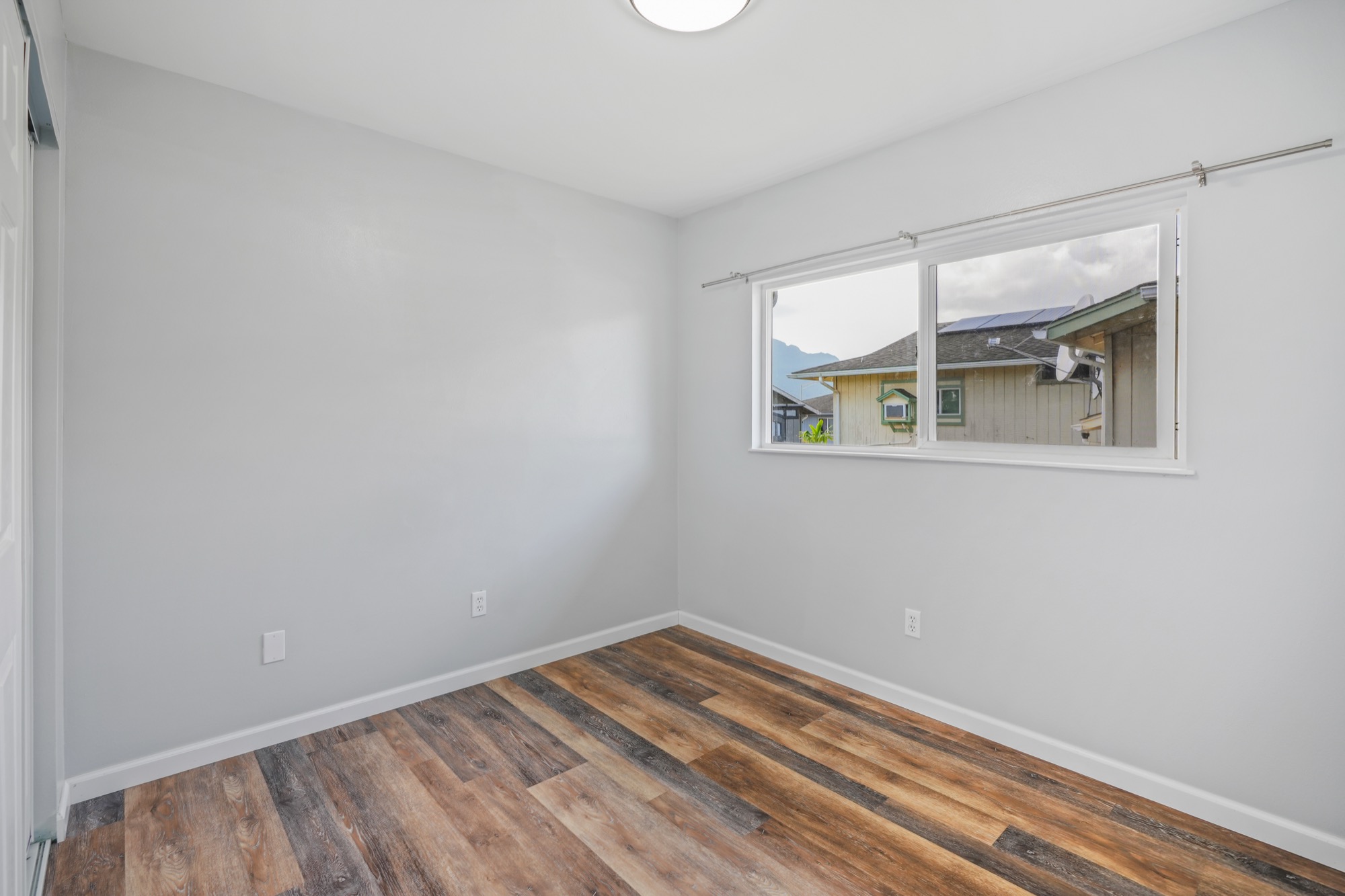 1974 Nana Pali Road Lihue, HI 96766 - Photo 24 of 28 an empty room with a window