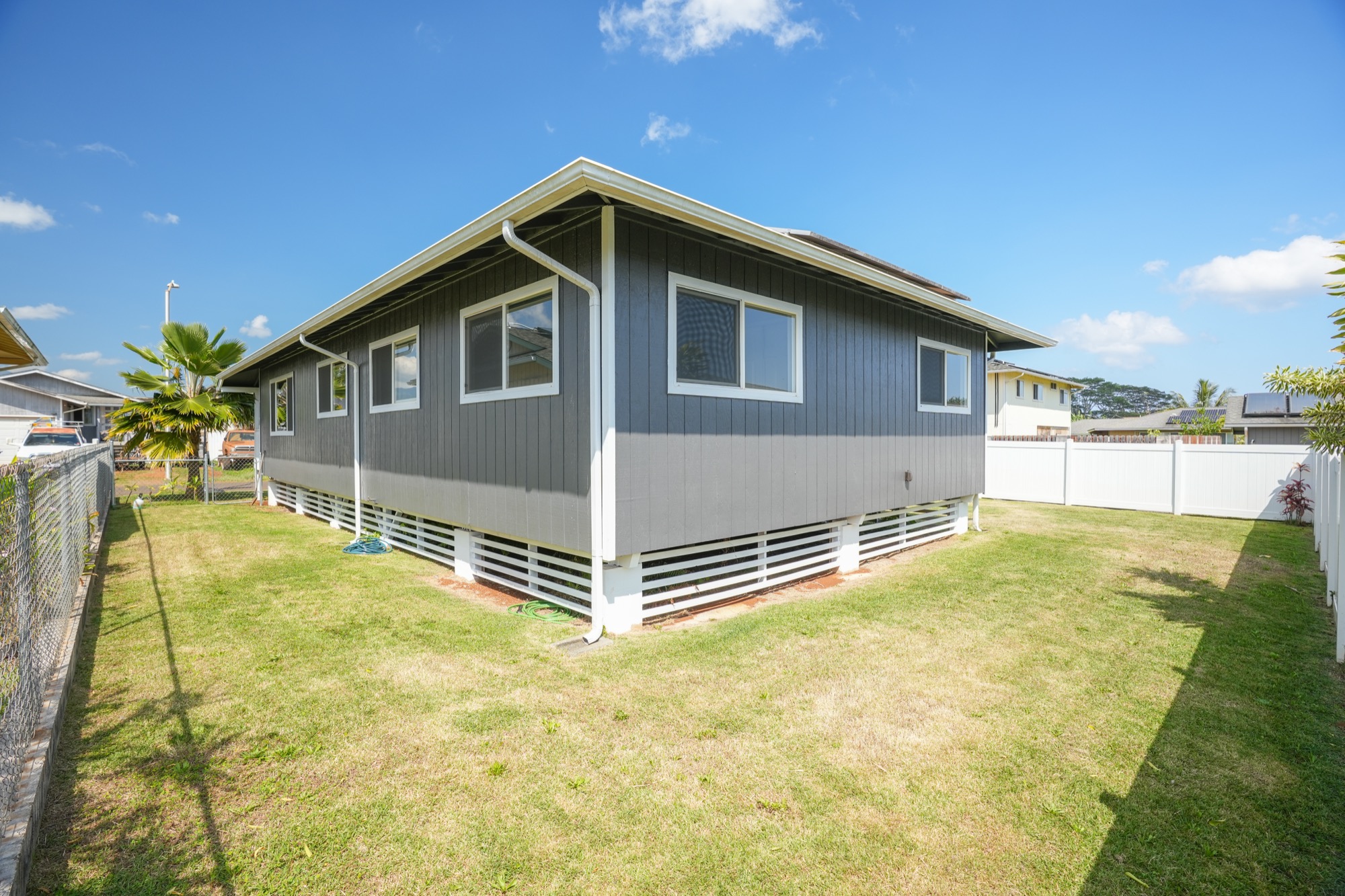 1974 Nana Pali Road Lihue, HI 96766 - Photo 10 of 28 a front view of a house with a yard