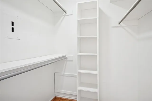 a view of an empty walk in closet